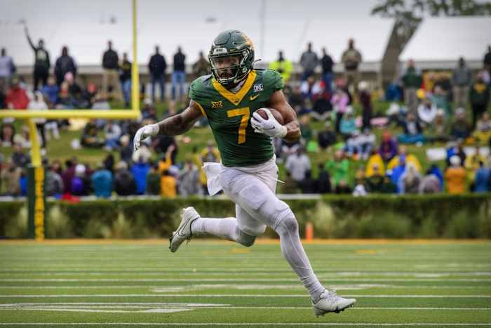 Baylor RB Abram Smith runs with football